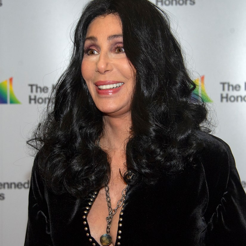 Cher Goes from Blonde to Brunette and Back Again in Giggly TikTok Debut for Pride Month